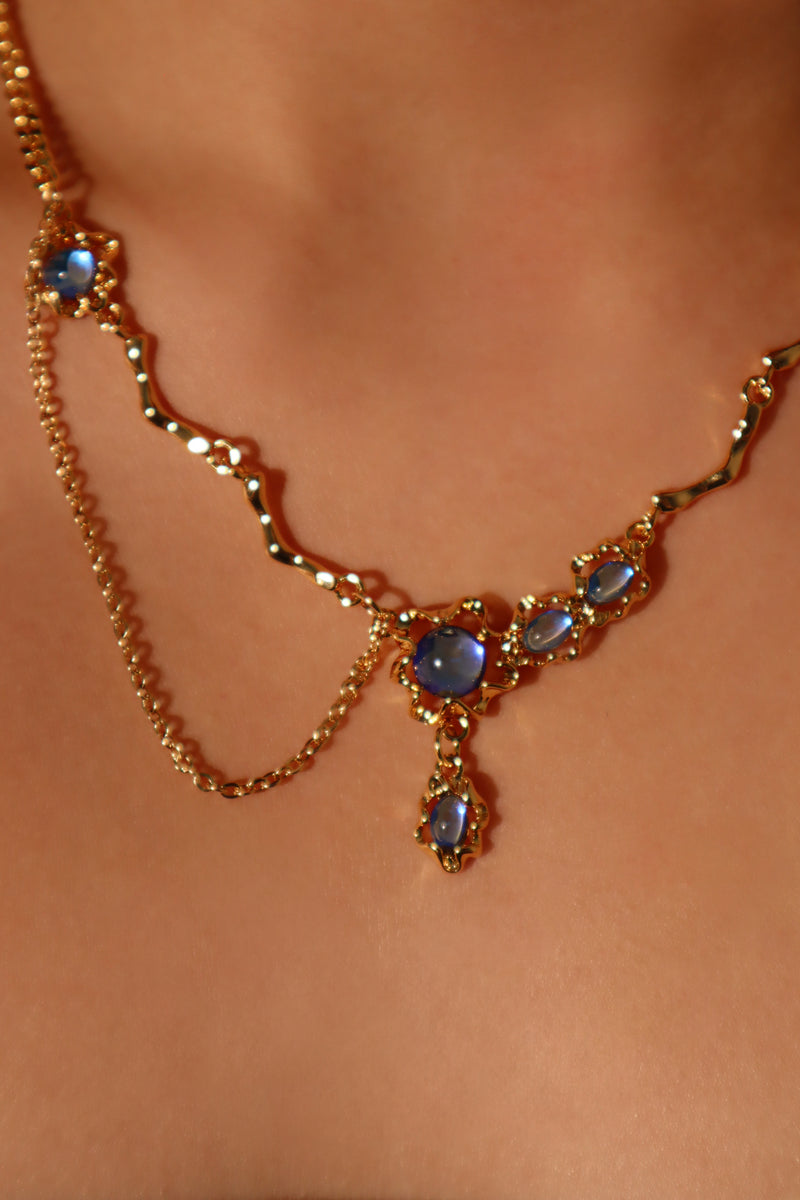 18K gold-plated dangle necklace with deep blue zirconia moonstones