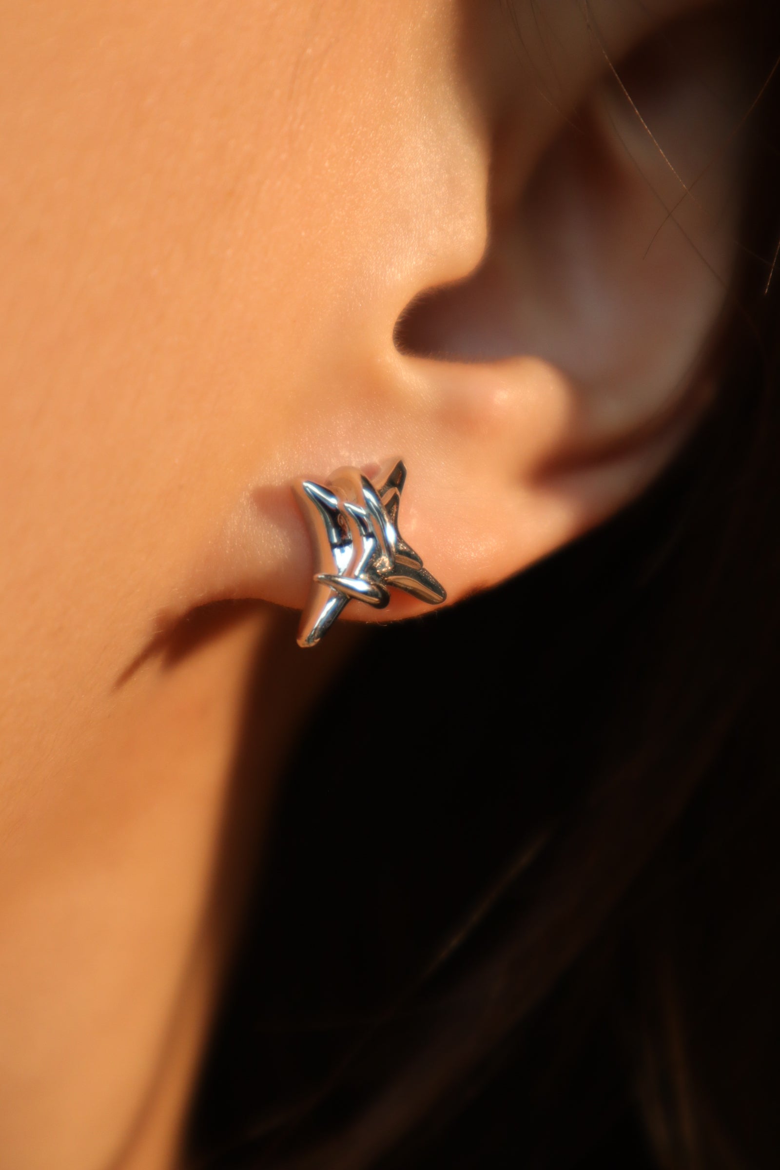 Platinum plated black gem stars earrings
