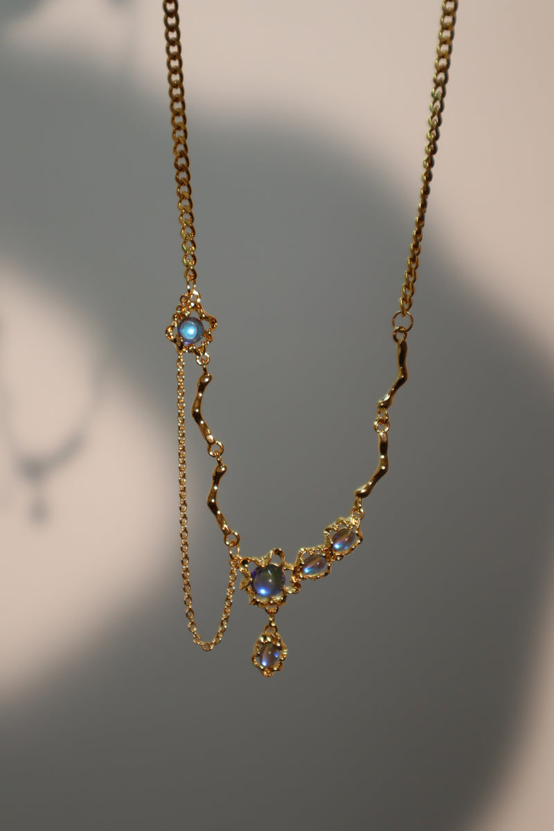 18K gold-plated dangle necklace with deep blue zirconia moonstones