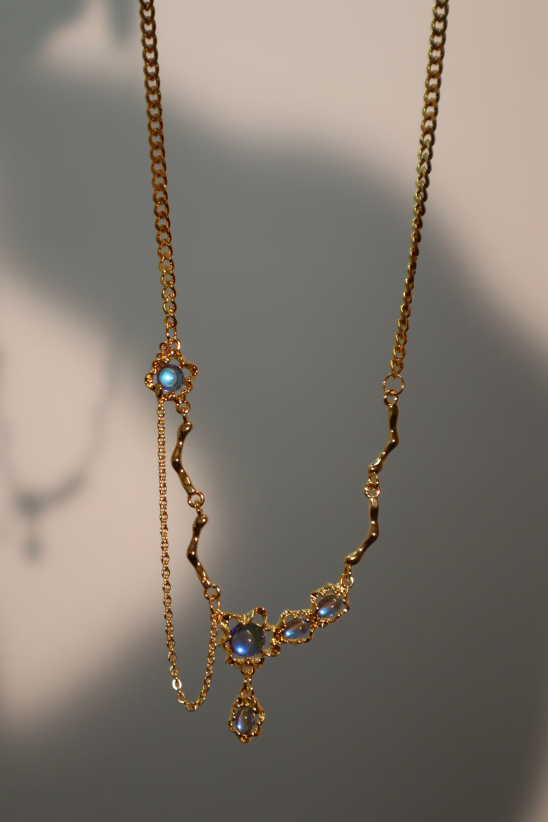 18K gold-plated dangle necklace with deep blue zirconia moonstones