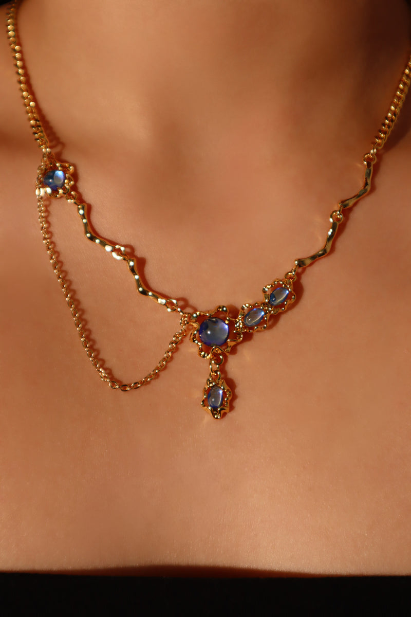 18K gold-plated dangle necklace with deep blue zirconia moonstones